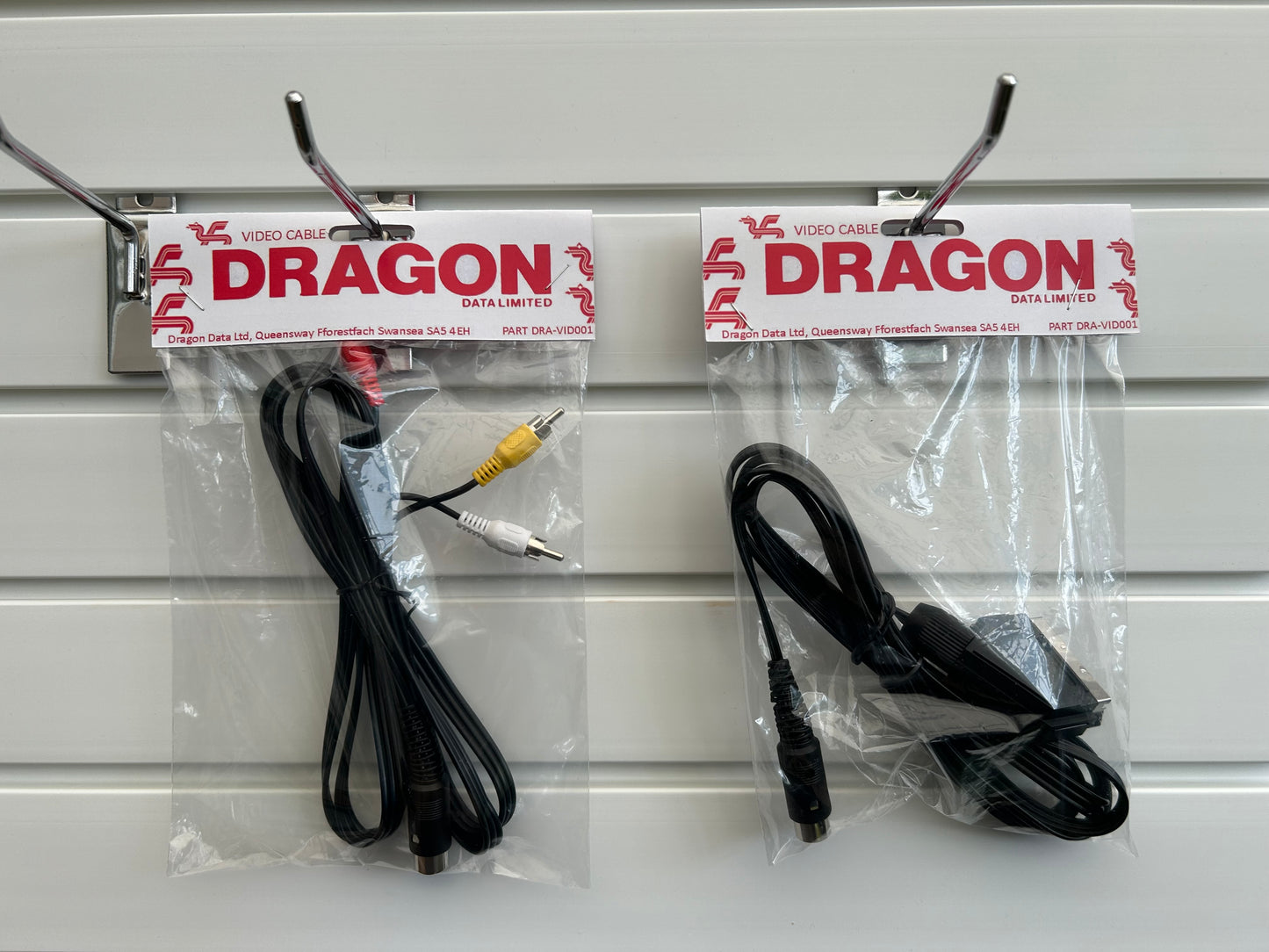 Two packaged Dragon video cables.| 9thbit-Retro Deluxe